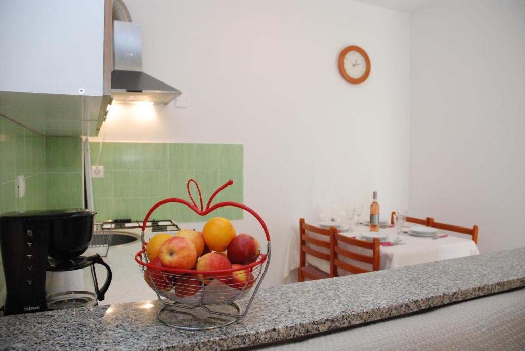 Kuchyň nebo kuchyňský kout v ubytování Apartmani Radin