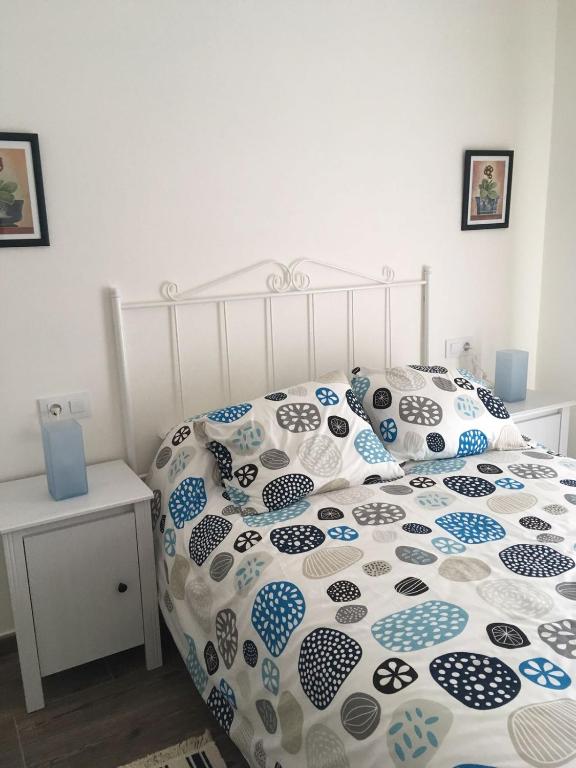 Postel nebo postele na pokoji v ubytování Casa rural Camelle Casa dos avós