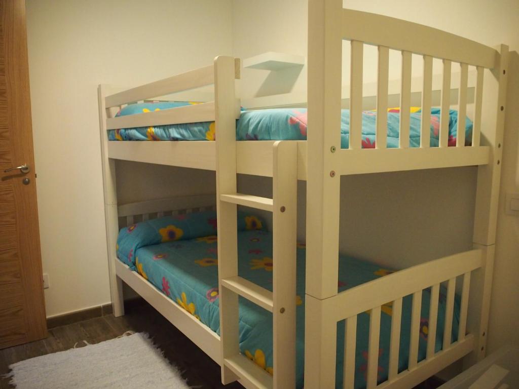 Postel nebo postele na pokoji v ubytování Casa rural Camelle Casa dos avós