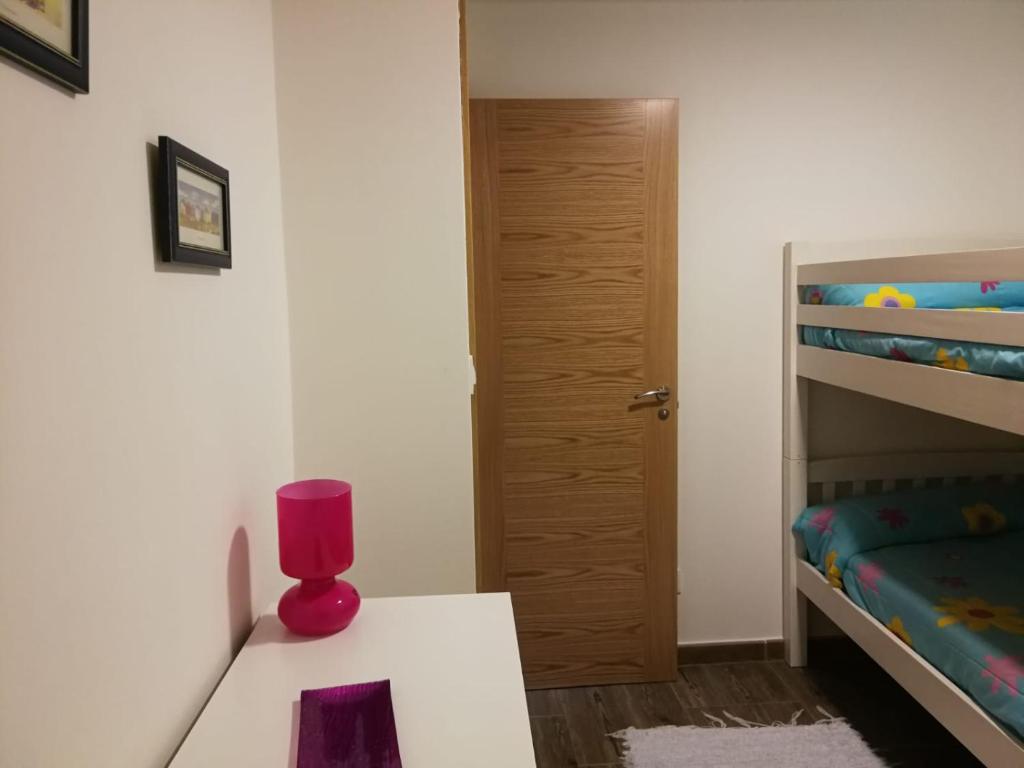 Postel nebo postele na pokoji v ubytování Casa rural Camelle Casa dos avós