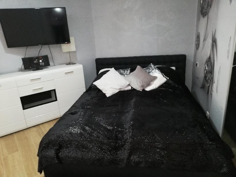 Posteľ alebo postele v izbe v ubytovaní Apartament Superior Maloves Władysławowo