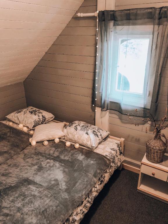 Postel nebo postele na pokoji v ubytování Holiday House Franc