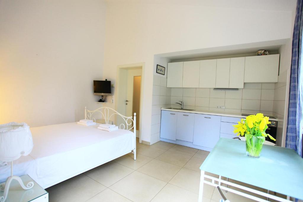 Kuchyňa alebo kuchynka v ubytovaní Apartmani Val