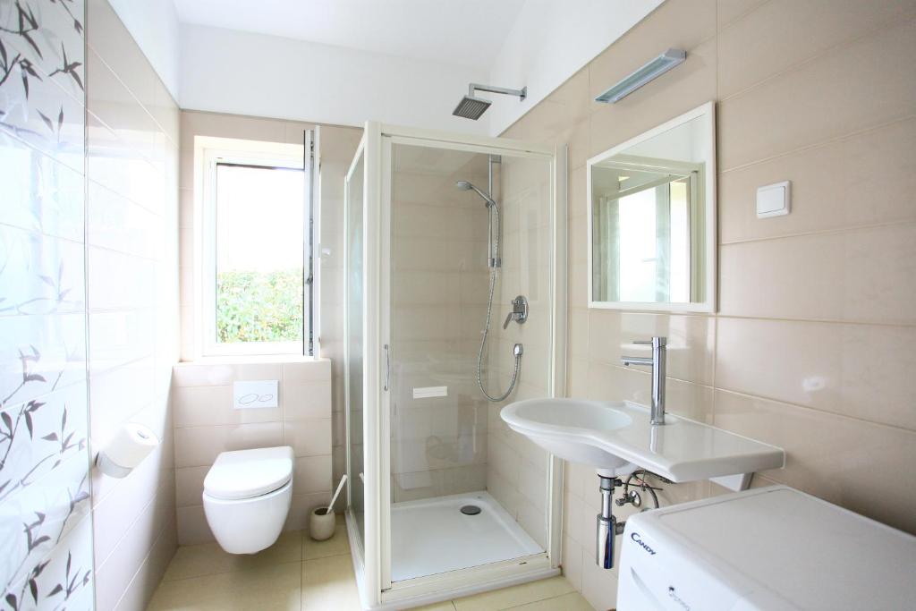 Kúpeľňa v ubytovaní Apartmani Val
