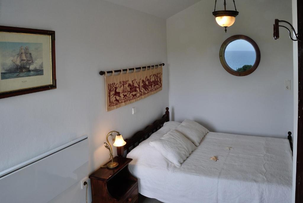 A bed or beds in a room at Beachfront Villa SeaShell Superior