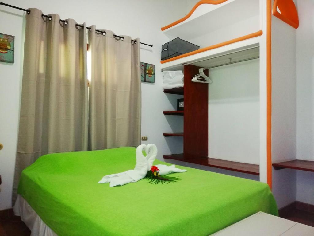 Postel nebo postele na pokoji v ubytování Villas Verdes