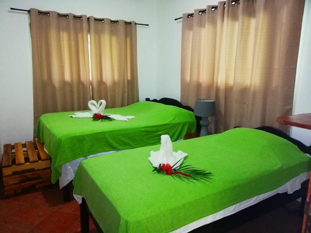 Postel nebo postele na pokoji v ubytování Villas Verdes