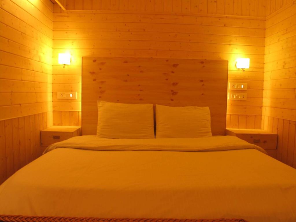 Postel nebo postele na pokoji v ubytování Hotel Mirage