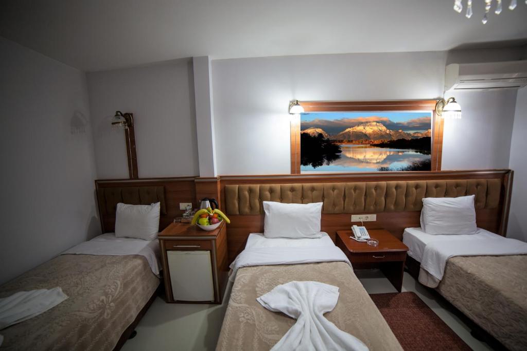 Postel nebo postele na pokoji v ubytování istanbul duhok hotel