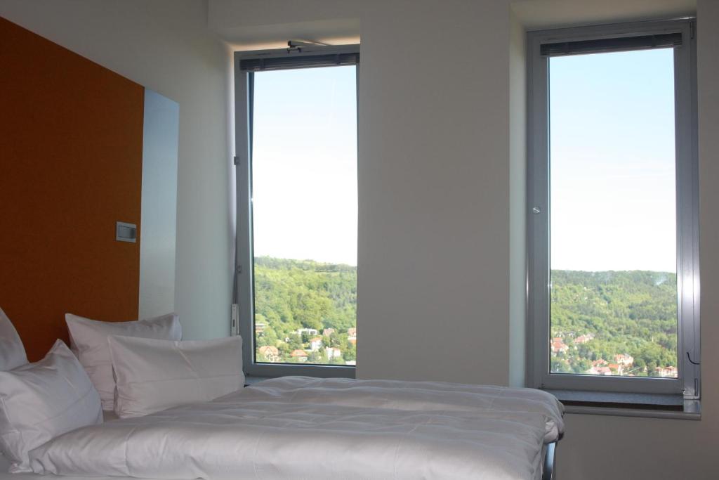 Postel nebo postele na pokoji v ubytování Scala Turm Hotel Restaurant