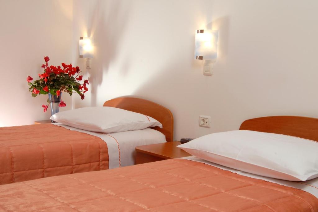 Ένα ή περισσότερα κρεβάτια σε δωμάτιο στο Guesthouse Bajc