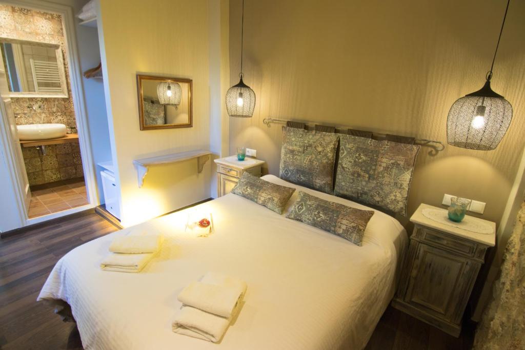 Posteľ alebo postele v izbe v ubytovaní Ganimede Hotel, Galaxidi