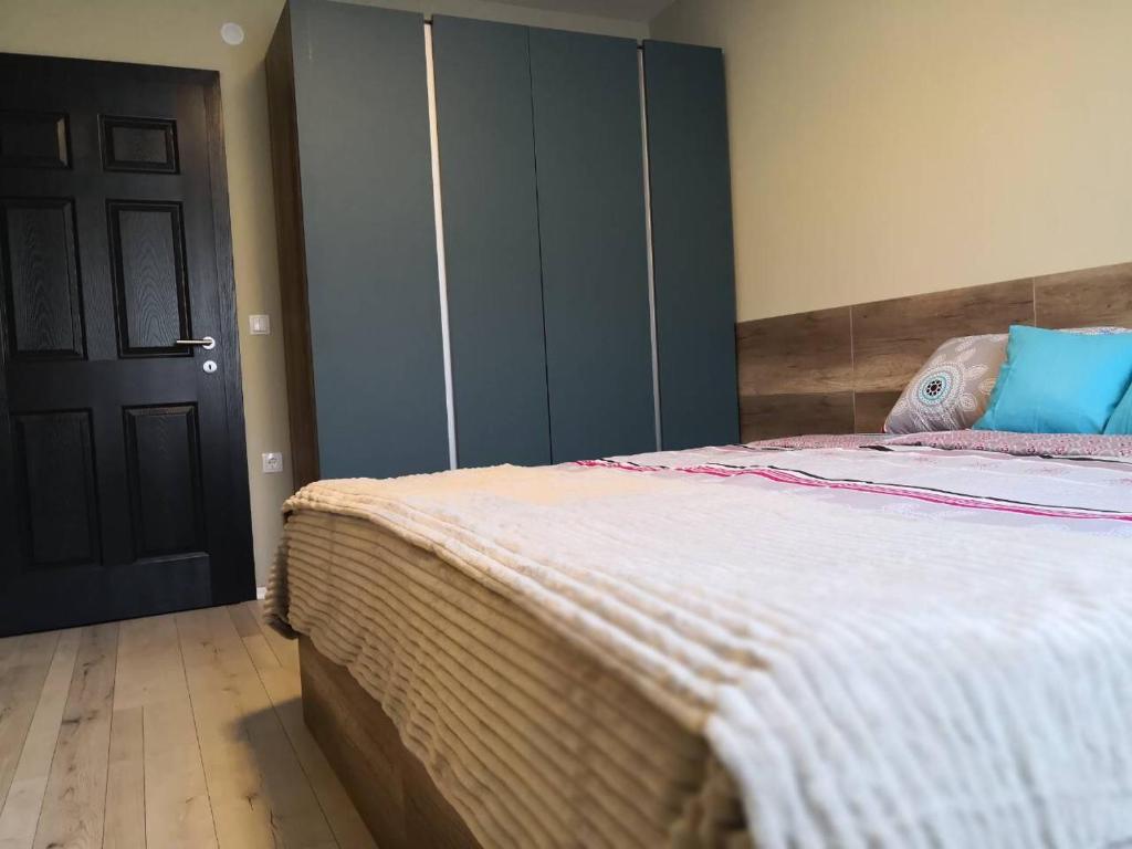 Ein Bett oder Betten in einem Zimmer der Unterkunft Mihajlovik LUX Apartment in Heart of SKOPJE