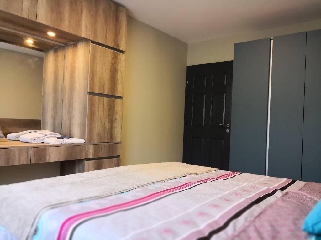Ein Bett oder Betten in einem Zimmer der Unterkunft Mihajlovik LUX Apartment in Heart of SKOPJE