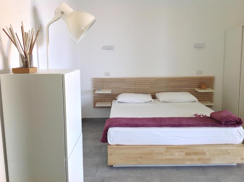 Postel nebo postele na pokoji v ubytování Punto di vista