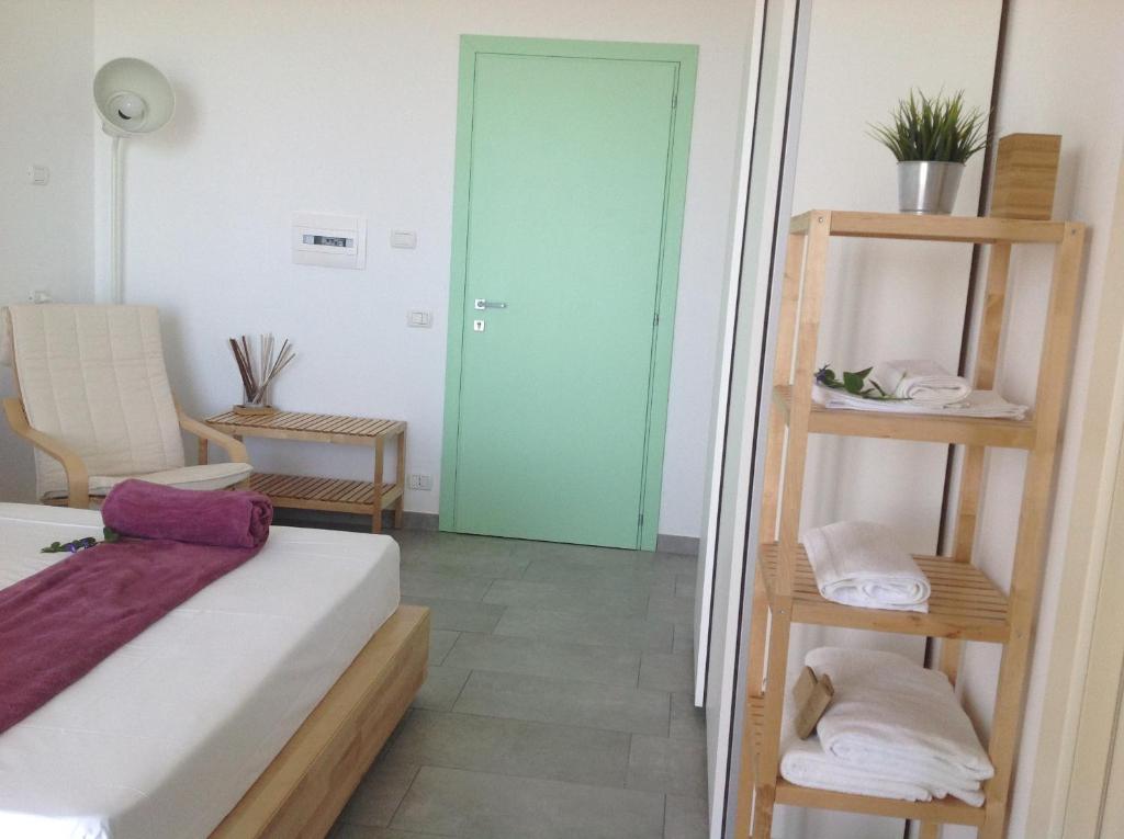 Postel nebo postele na pokoji v ubytování Punto di vista