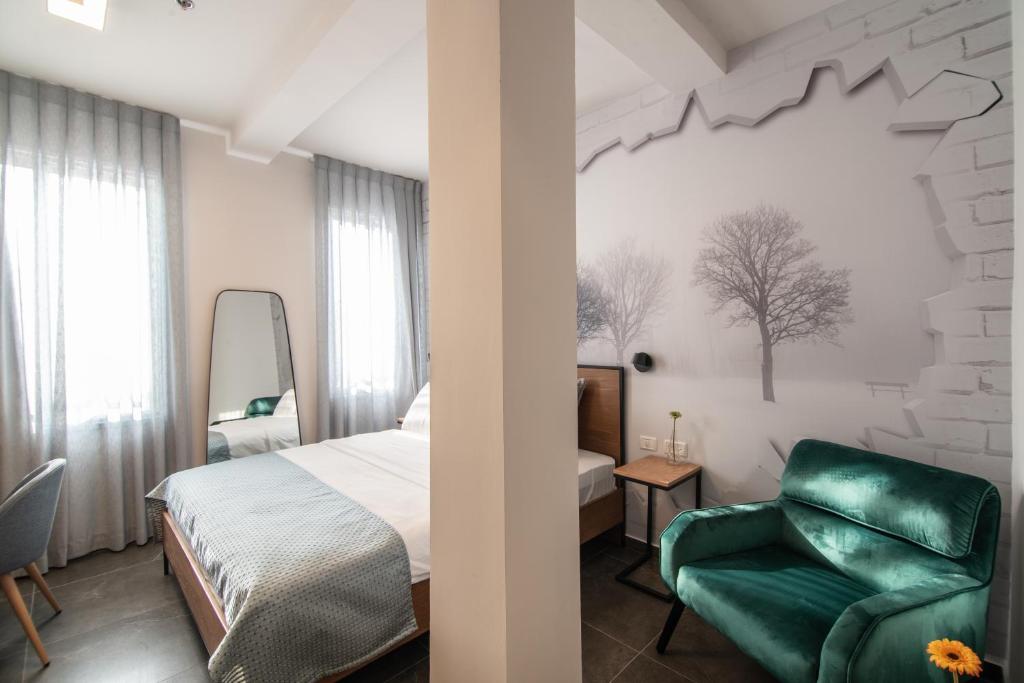 Postel nebo postele na pokoji v ubytování 27Montefiore - Urban ApartHotel TLV