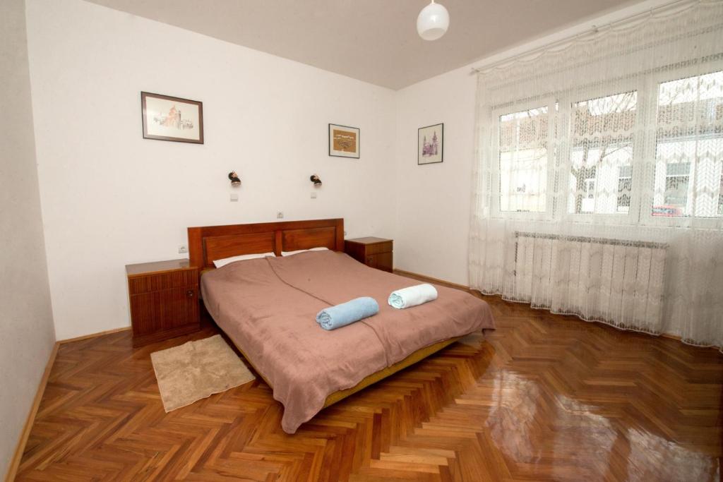 Posteľ alebo postele v izbe v ubytovaní House of Tea