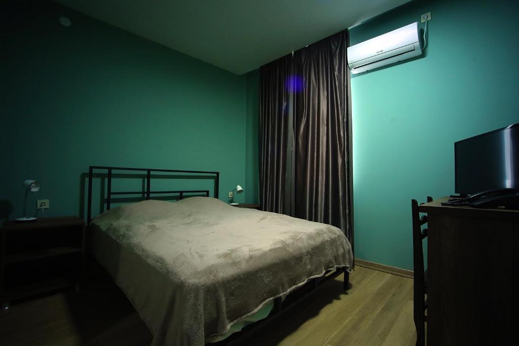 Postel nebo postele na pokoji v ubytování Hotel AGUNA