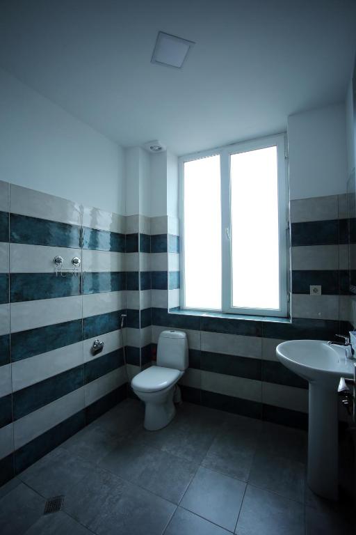 Koupelna v ubytování Hotel AGUNA