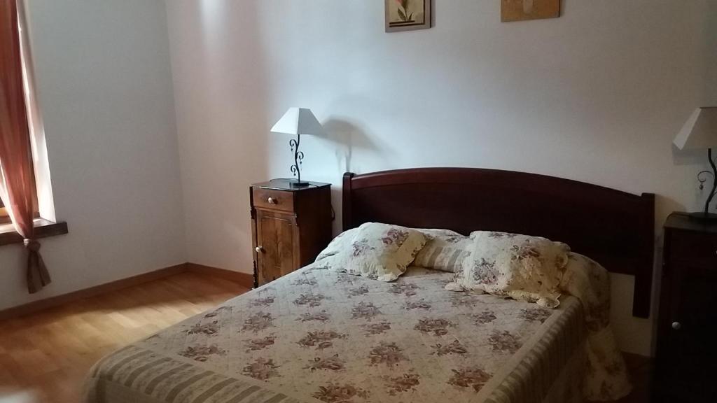 Postel nebo postele na pokoji v ubytování Apartaments Morello