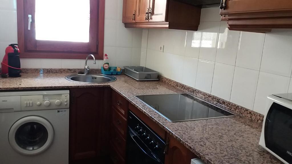 Kuchyň nebo kuchyňský kout v ubytování Apartaments Morello