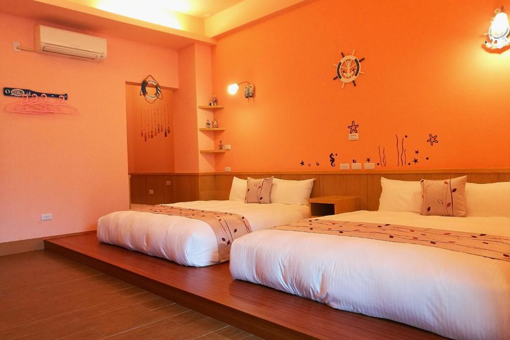 Postel nebo postele na pokoji v ubytování Love Ocean & Happy Bay HomeStay