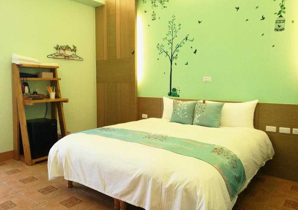 Postel nebo postele na pokoji v ubytování Love Ocean & Happy Bay HomeStay