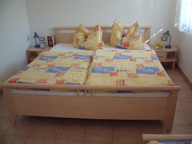 Postel nebo postele na pokoji v ubytování Residence Hofer
