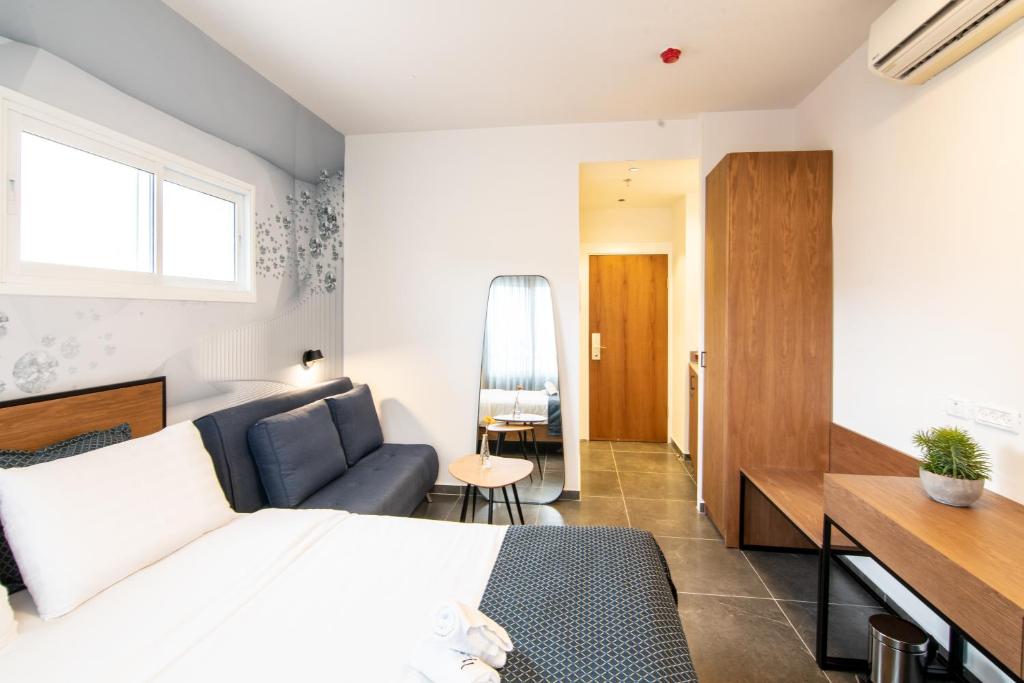 Posezení v ubytování 27Montefiore - Urban ApartHotel TLV