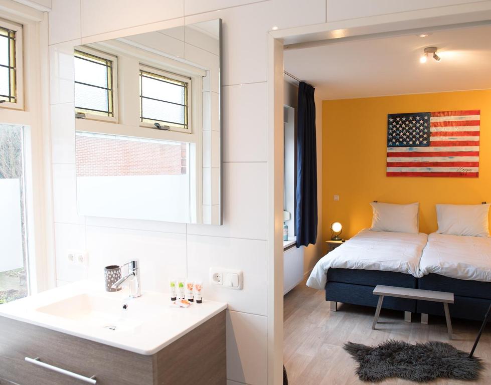 Postel nebo postele na pokoji v ubytování Shortstay Bilderdijk