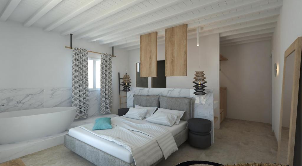 Кровать или кровати в номере Apiro Mykonos