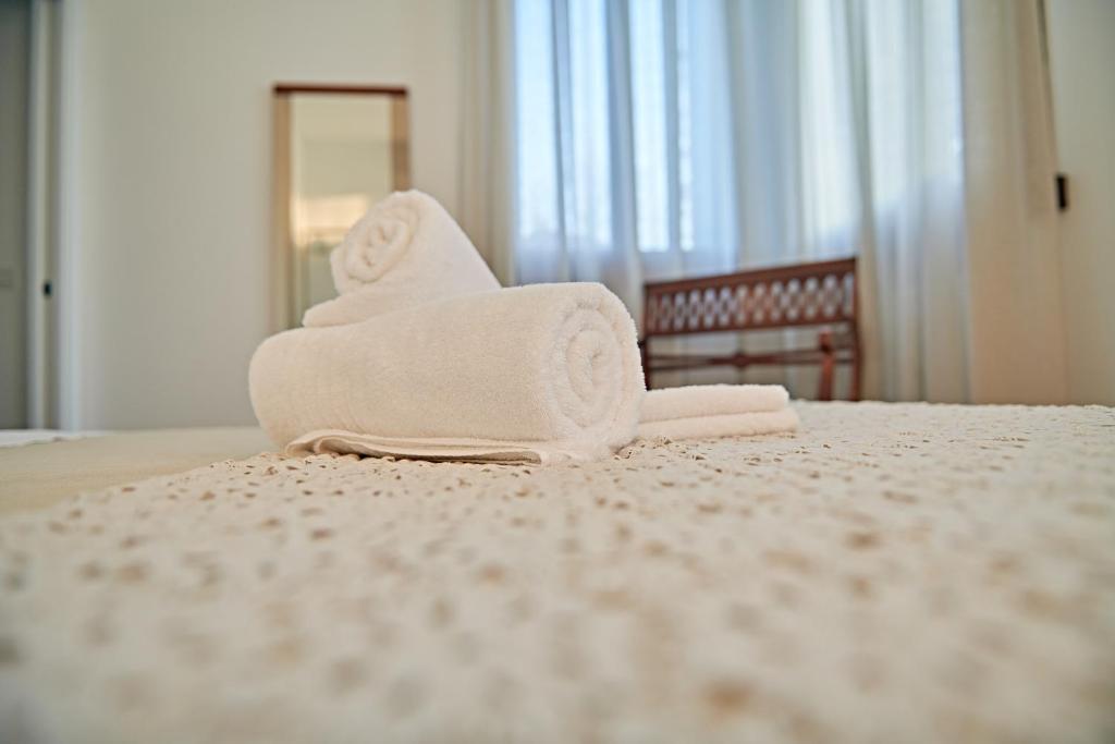 Letto o letti in una camera di B&B Villa Romano