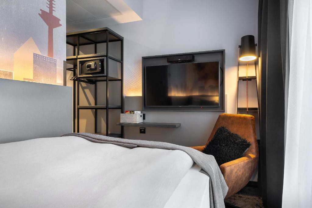 Cama ou camas em um quarto em Holiday Inn - the niu, Charly Frankfurt City by IHG