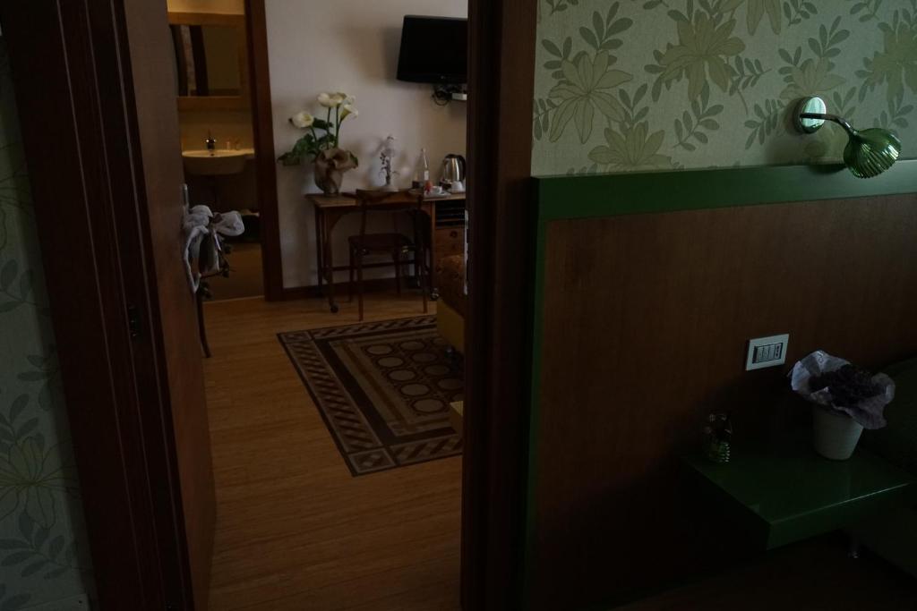 TV a/nebo společenská místnost v ubytování Residenza Mordini
