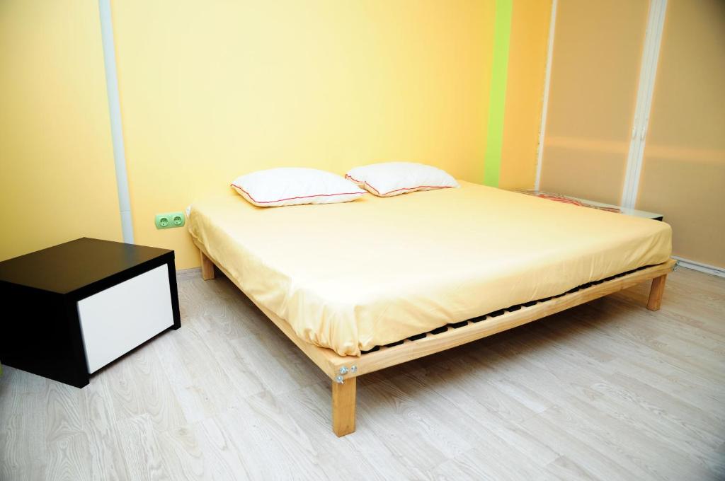Un pat sau paturi într-o cameră la Homestay on Kanatna Street 57
