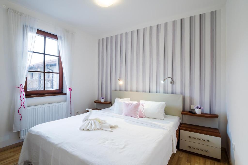 Postel nebo postele na pokoji v ubytování Hotel Bonsai