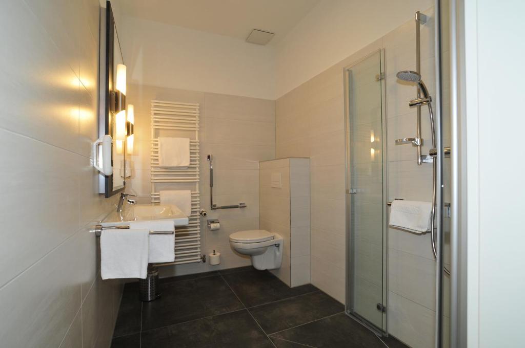 Koupelna v ubytování Hotel Am Obermarkt