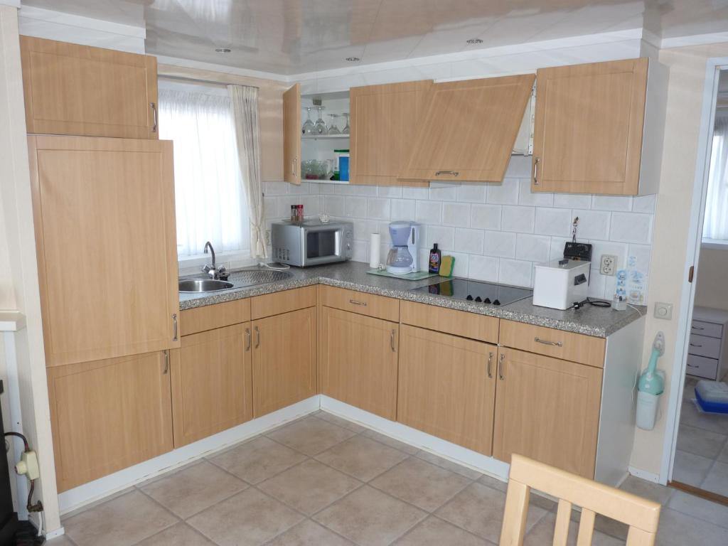 Kuchyň nebo kuchyňský kout v ubytování Beachside Vakantiepark