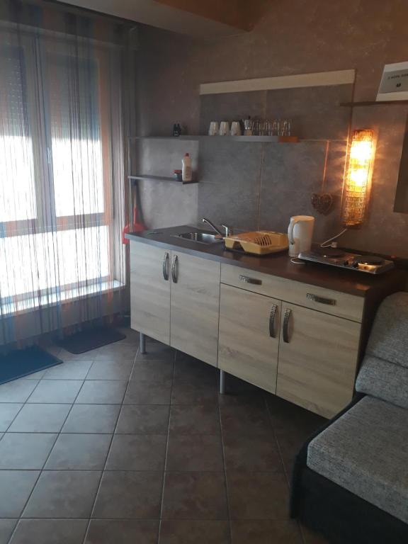 Una cocina o zona de cocina en Splendor apartman