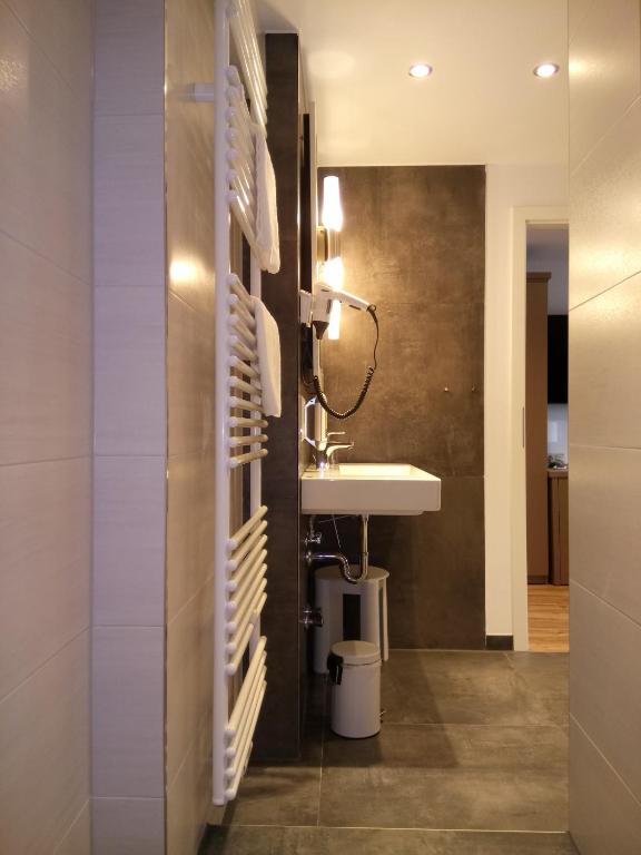 Koupelna v ubytování Hotel Am Obermarkt