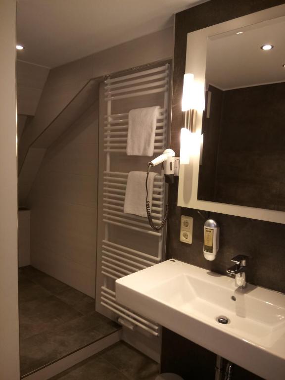 Koupelna v ubytování Hotel Am Obermarkt