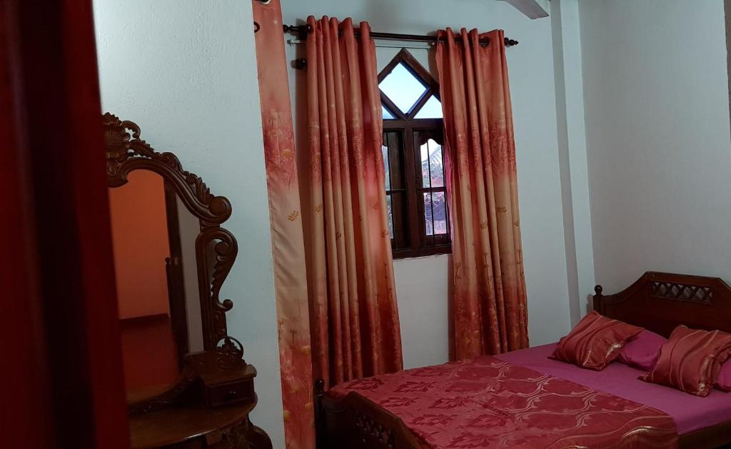 Postel nebo postele na pokoji v ubytování Sea Shine Guest House