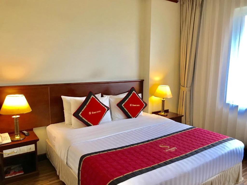 Postel nebo postele na pokoji v ubytování S79 Sunny Hotel 2