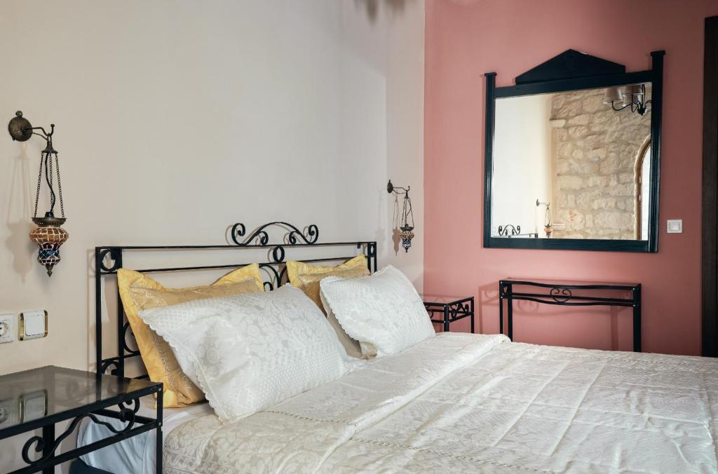 Postel nebo postele na pokoji v ubytování Diamond Suites