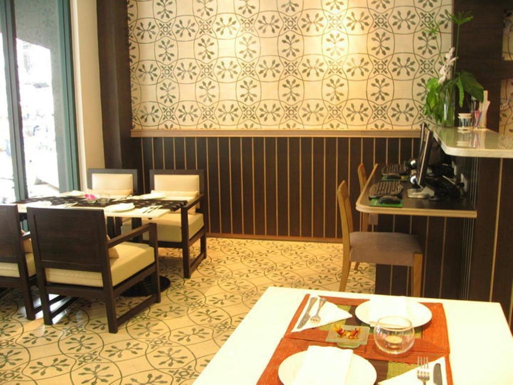 Posezení v ubytování Aphrodite Inn Bangkok
