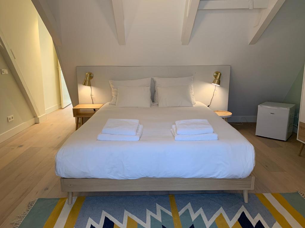 Ein Bett oder Betten in einem Zimmer der Unterkunft Kangaroom