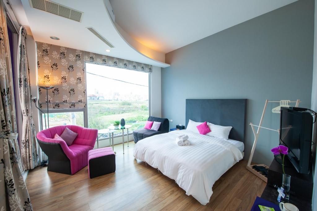 Postel nebo postele na pokoji v ubytování Hai Pu B&B