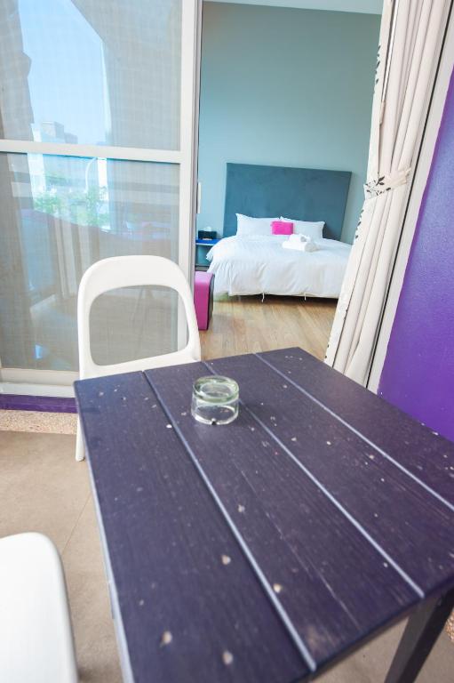 Postel nebo postele na pokoji v ubytování Hai Pu B&B