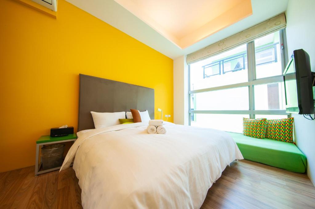 Postel nebo postele na pokoji v ubytování Hai Pu B&B
